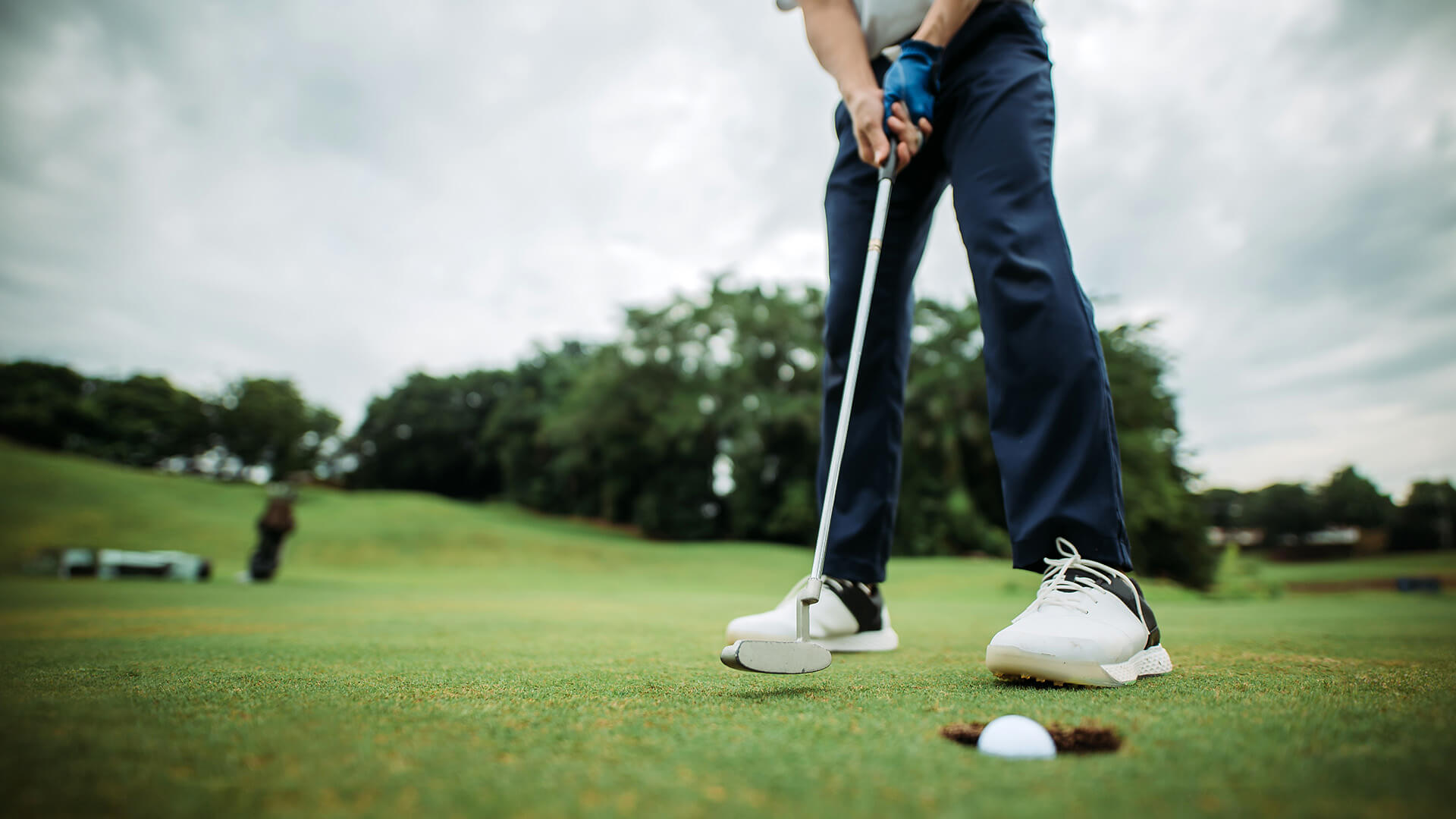 golfer gripping golf club